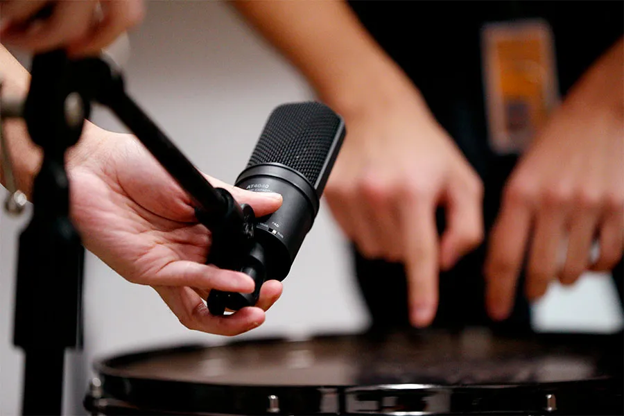 audio-recording-students-setting-microphone_workshop-carousel-5.0